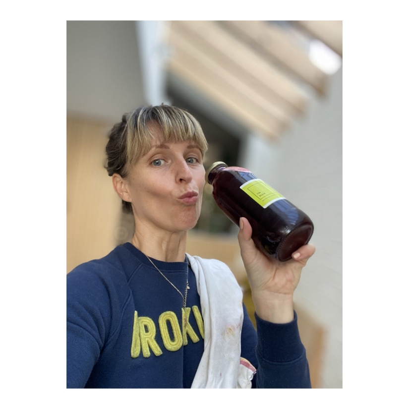 Dorota, founder of On Root, with one of her healthy drinks