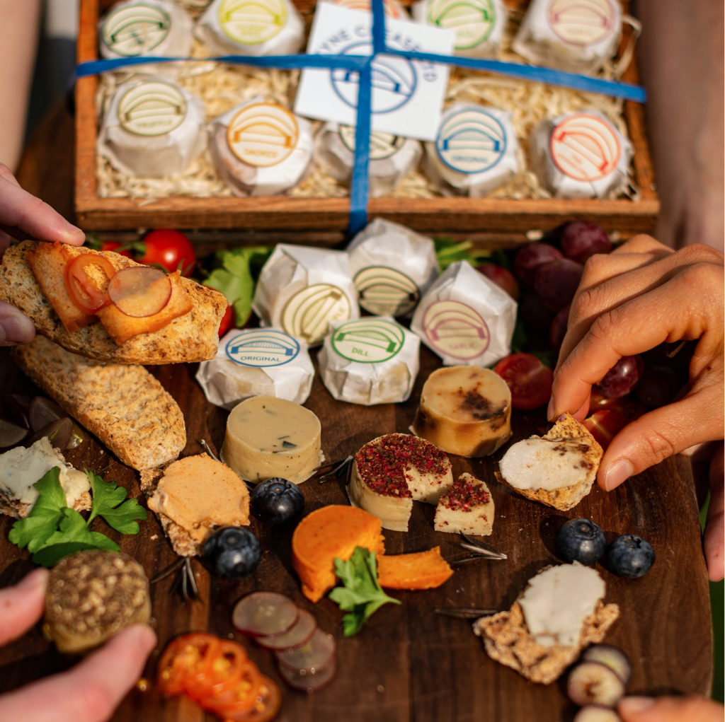 An image of a festive chease board along with other treats.